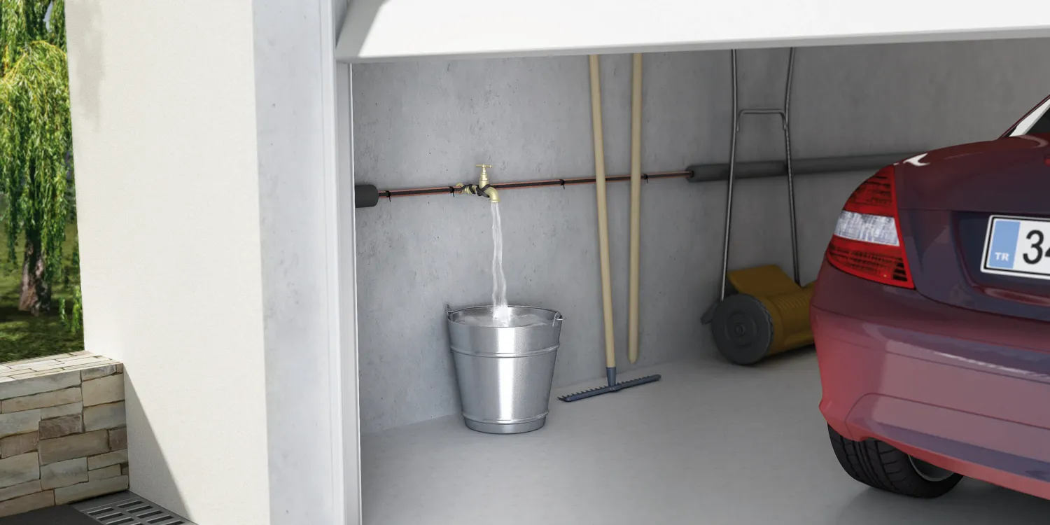 Garage with open door revealing a pipe and bib-tap with free-flowing water.