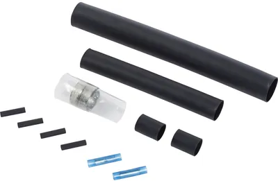 S-06 heat shrink splice consisting of butt-splice terminals and heat shrink tubing.